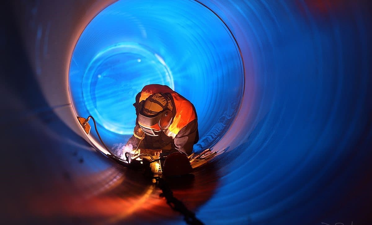 Pipeline construction at an oil and gas facility